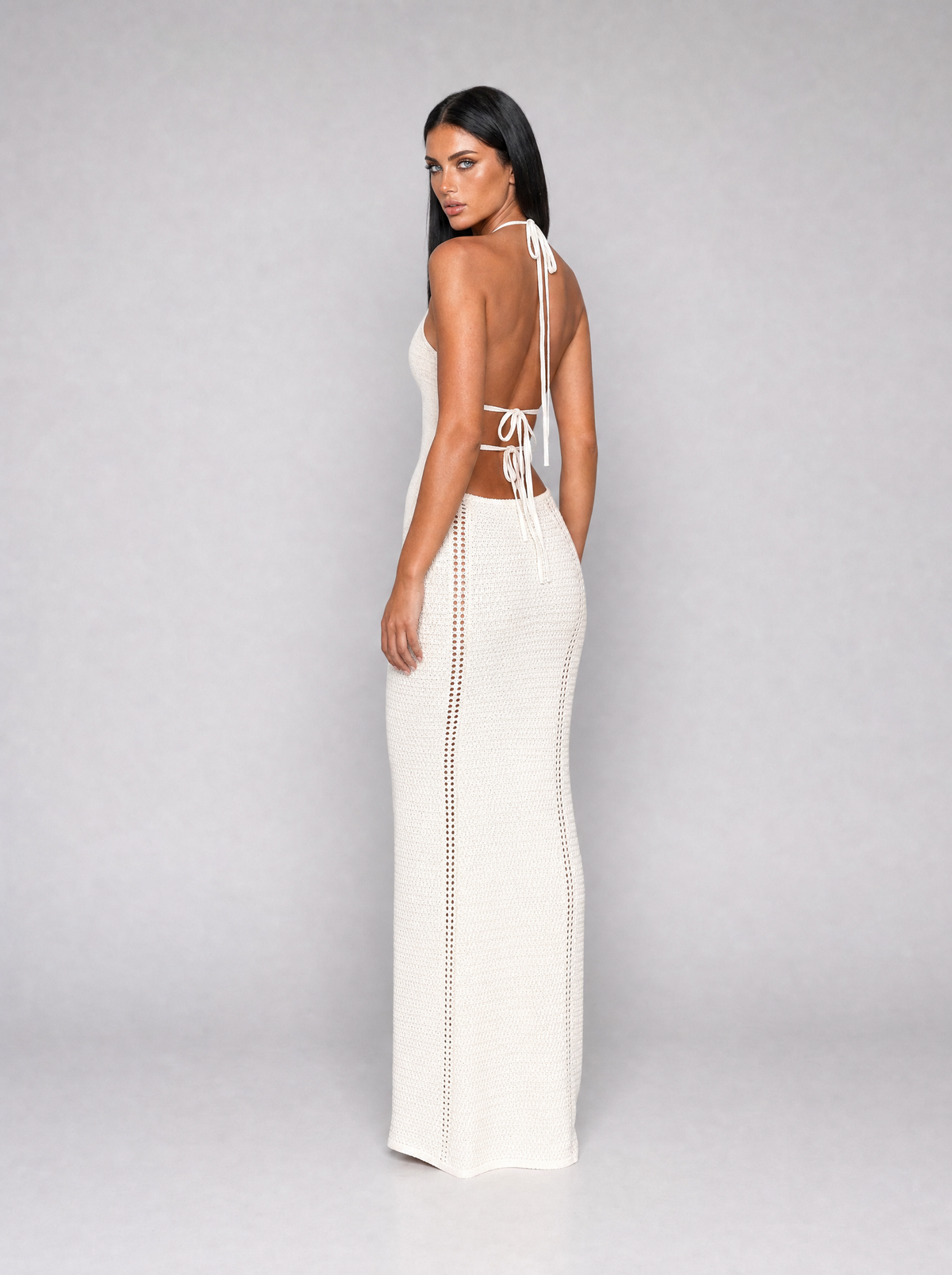 Delphine halter maxi dress in white, three-quarter back view