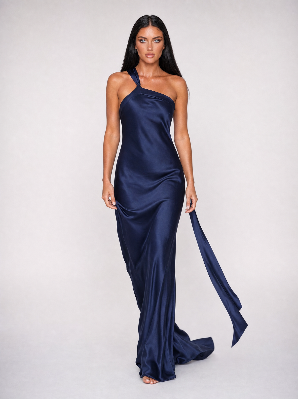 Anouk one-shoulder maxi dress in dark blue satin, walking