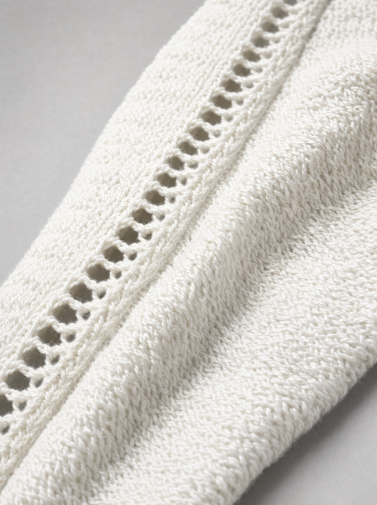 Delphine dress detail: crochet knit with ladder-stitch panel