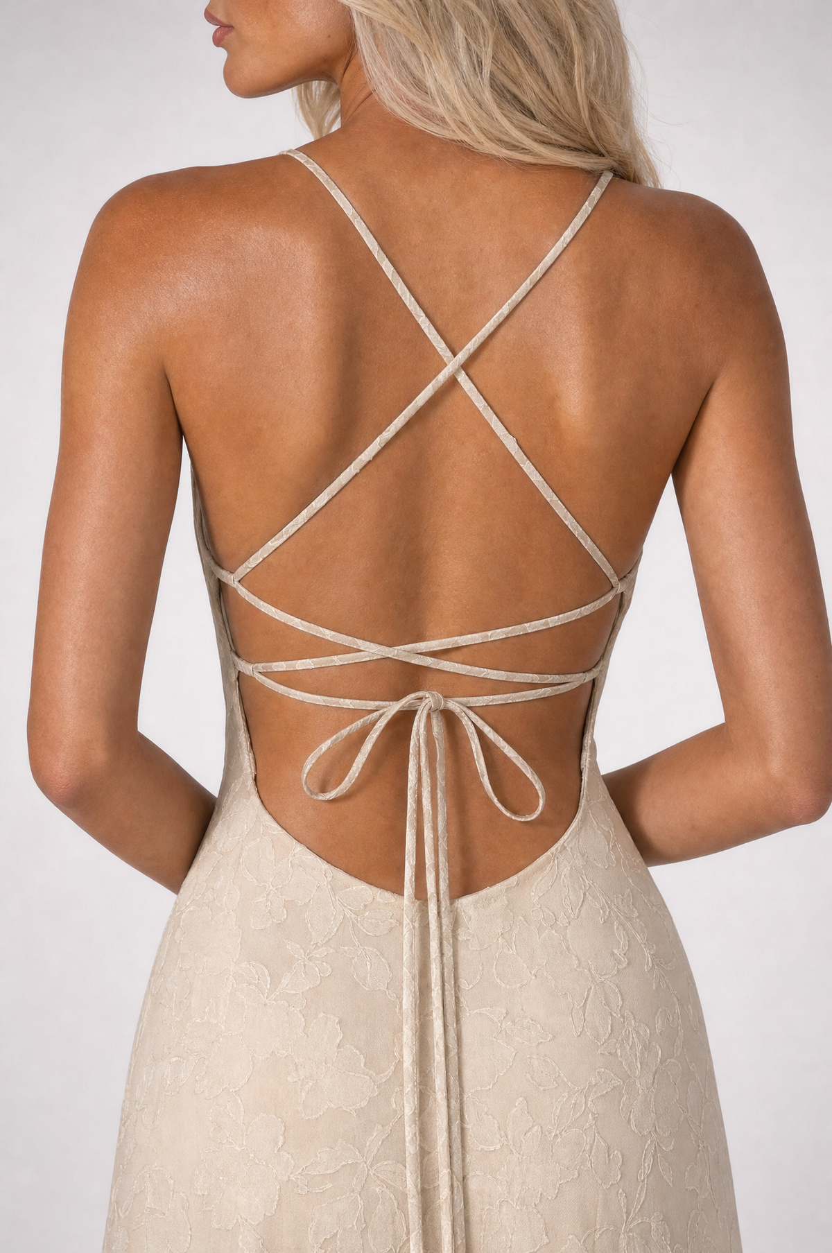 Back detail - criss-cross lace-up straps tied into a bow